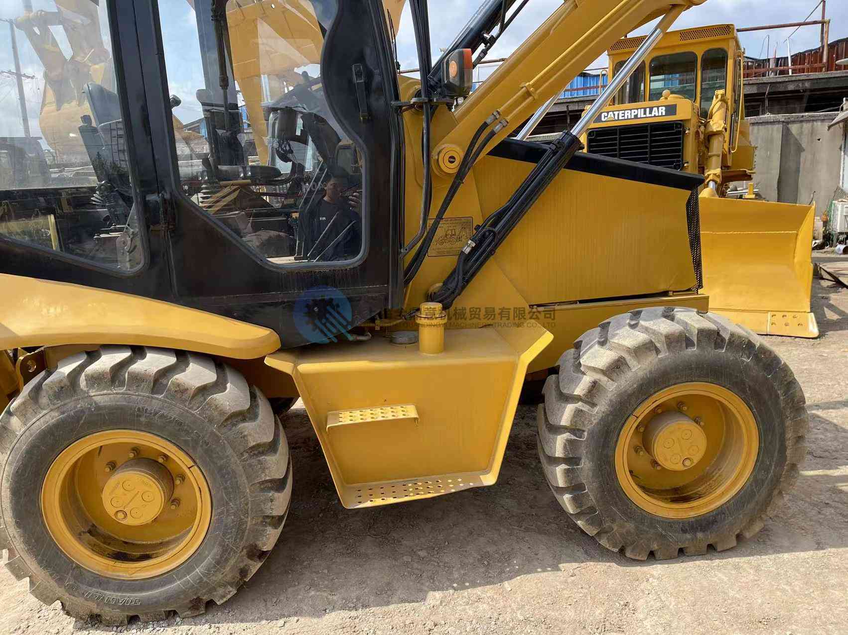 Tractopelle CAT 416E d'occasion